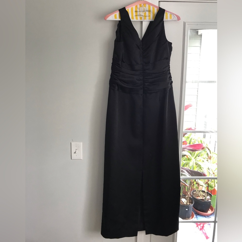 Worn once. Beautiful black sleeveless ruched top (front & back) Gown. Size 12.